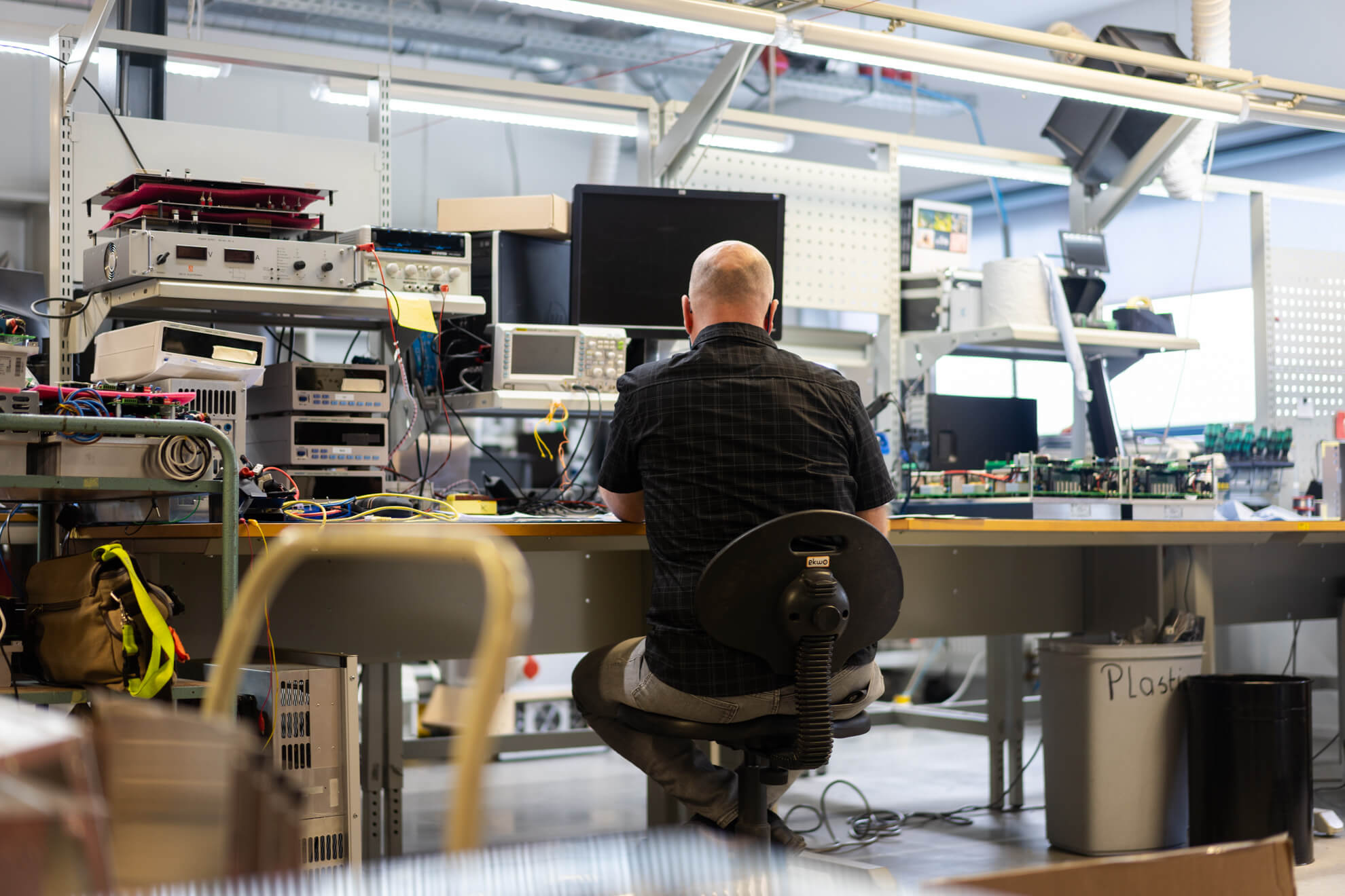 Man working on engineering at Heliox office
