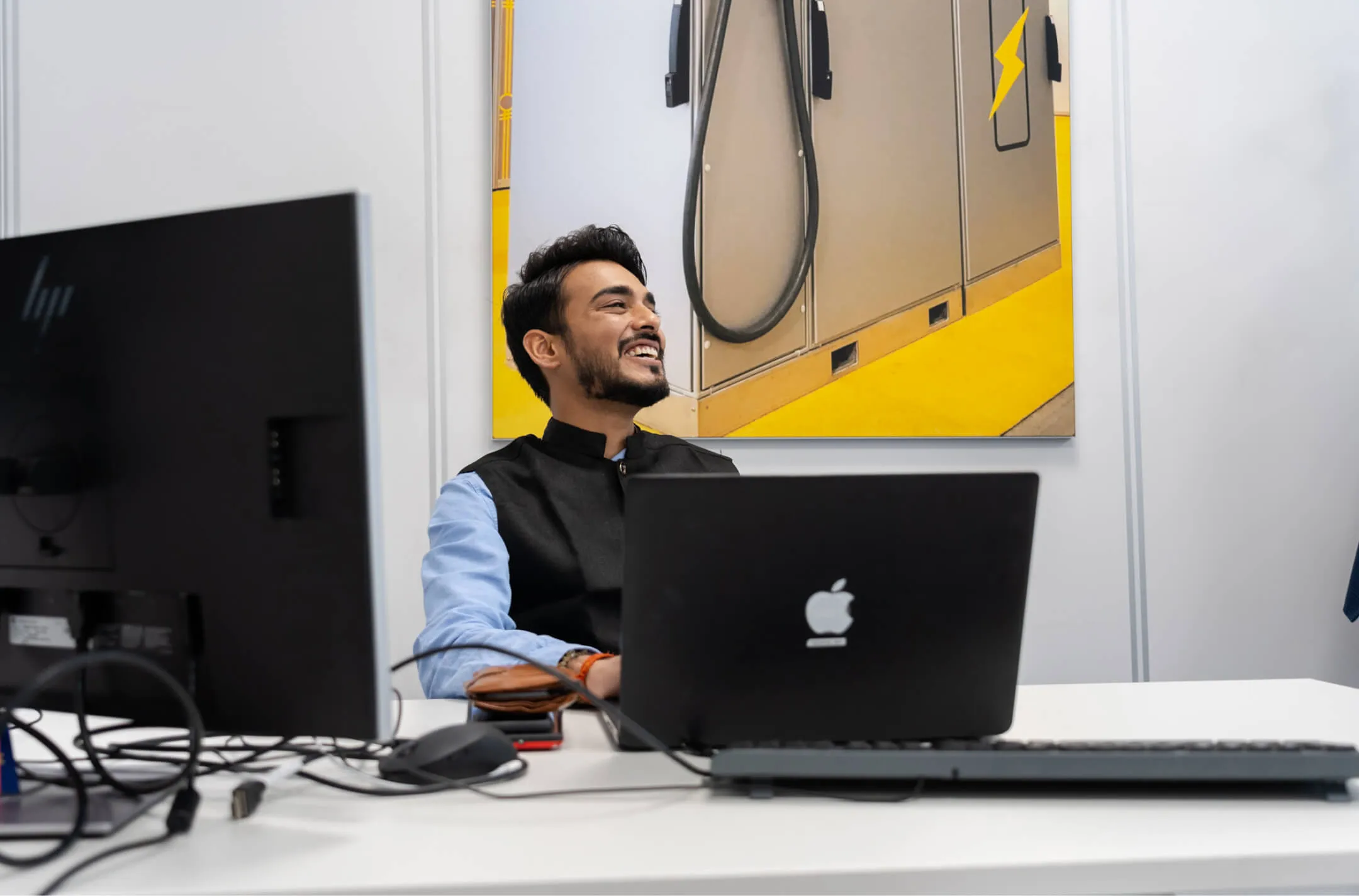 Man laughing at Heliox office